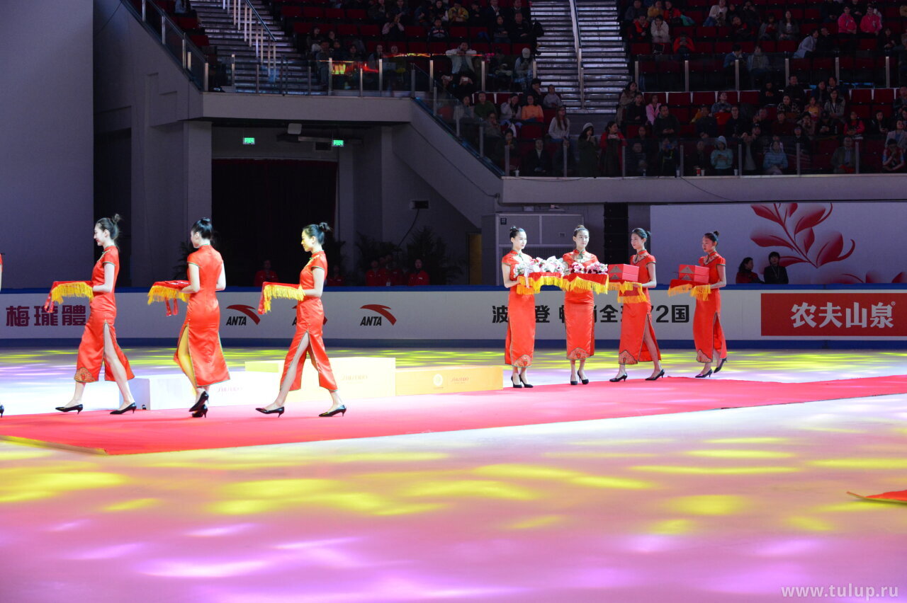 Tall Chinese ladies march in